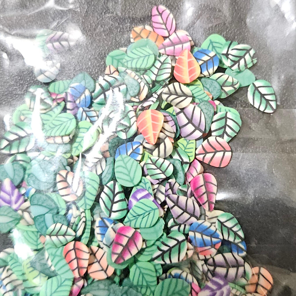 Leaves Green leaves made of polymer clay.